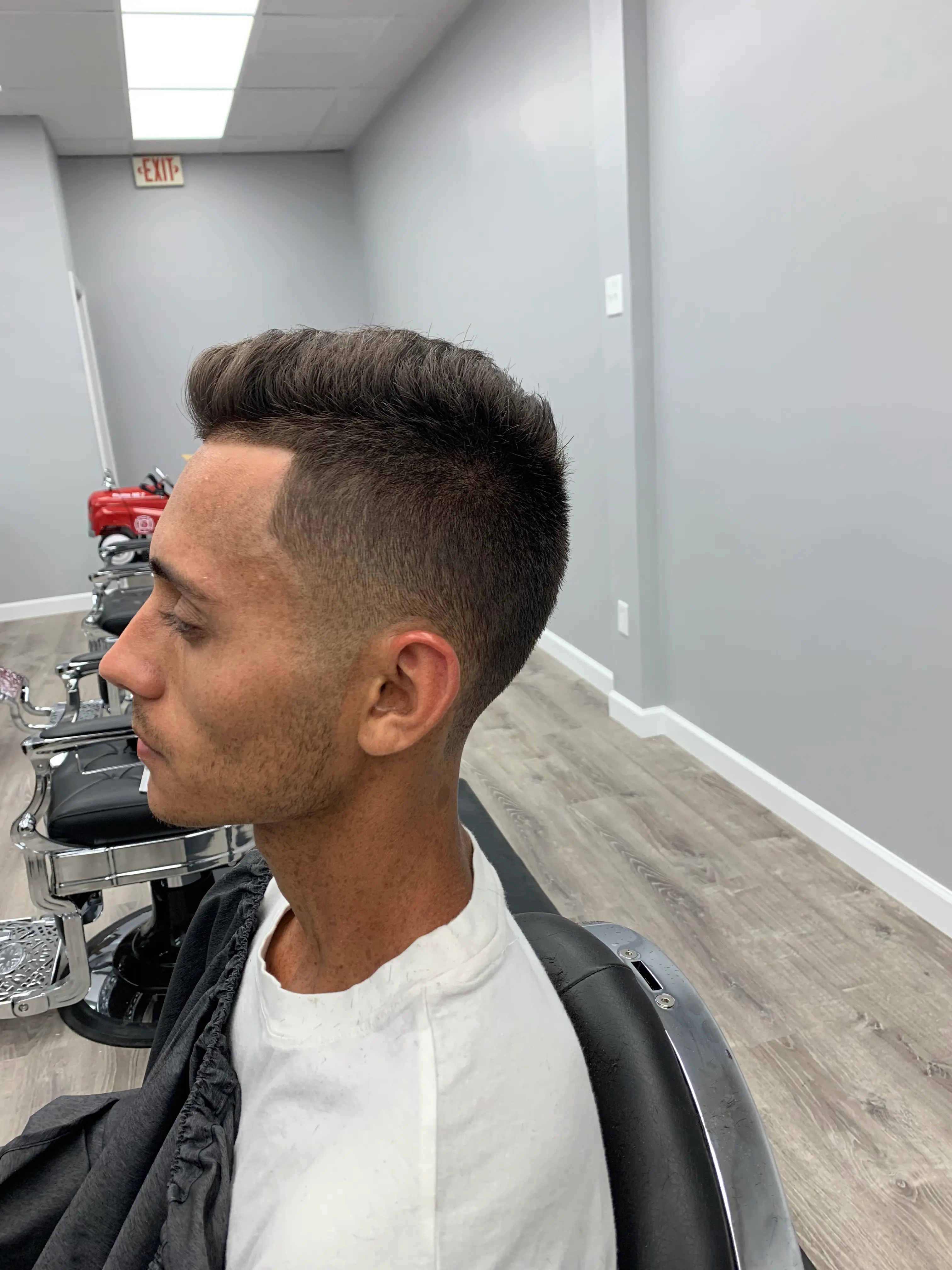 Professional fade haircut styling